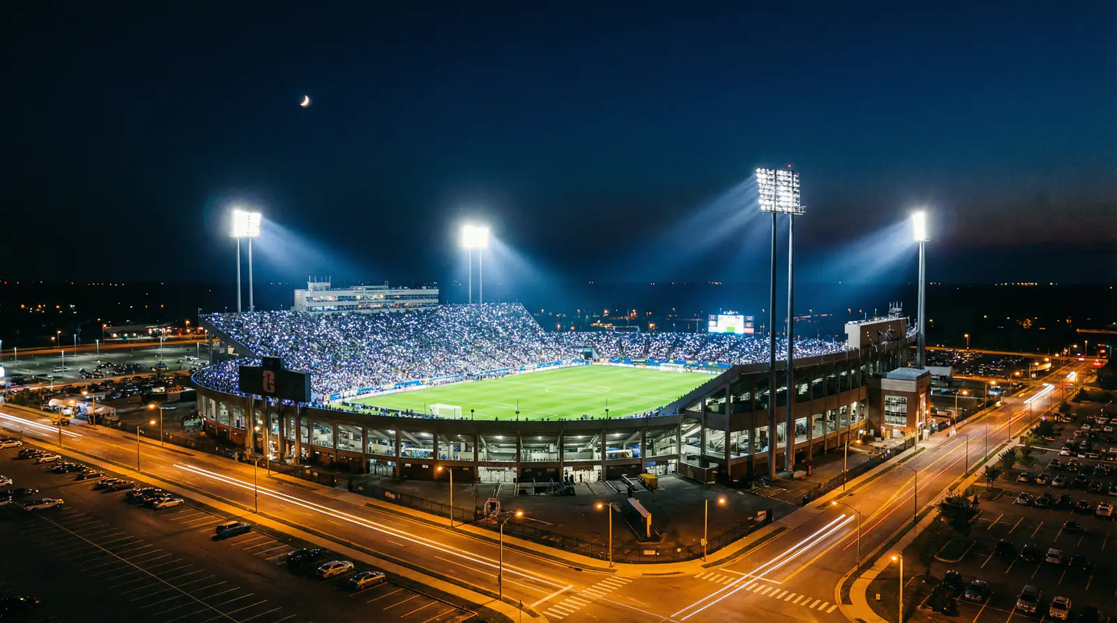 World Cup 2026 stadium floodlights illuminating the pitch at night during a late kick-off match